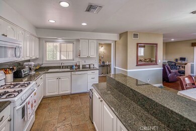 Looking from kitchen towards front door area
