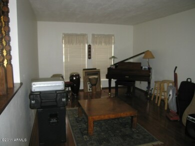 Large living room with wood floor