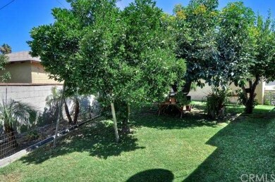 Another view of large back yard with additional fr
