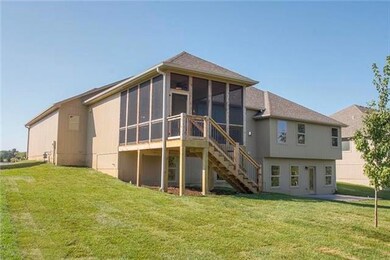 View of the back of the home.  Reverse 1.5 Story h