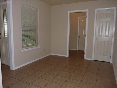 This small area is next to the front door and laundry room and could be used as a mud room.