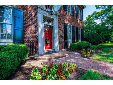Architectural features include Flemish bond brick 