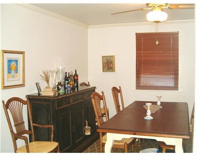 Dining Room. Gorgeous hardwood flooring and crown 