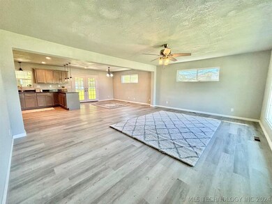 Open Layout of Living Area & Dining Space