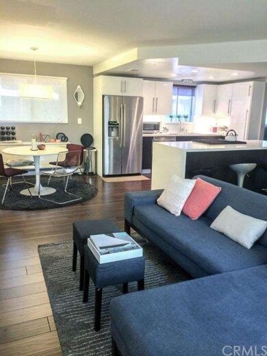 full view of liv rm , dining area & kitchen