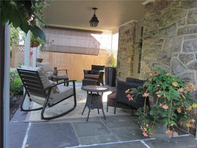 Enjoy a Flagstone Porch easily accessed by door to