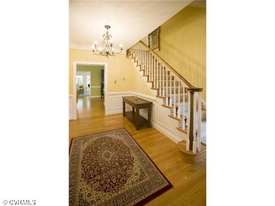 Exterior Front - Elegant foyer with hardwood floor