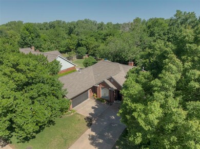 View from above of property with a heavily wooded area