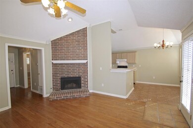 Relax in the great room beside the cozy fireplace.