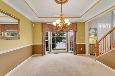Dining room with bay extension and crown mouldings