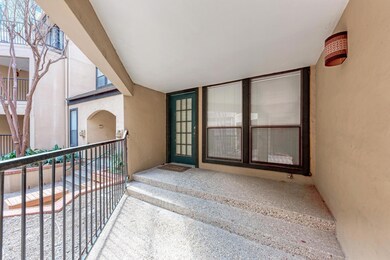 Doorway to property with stucco siding