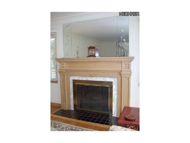 This space provides a pretty fireplace which compl