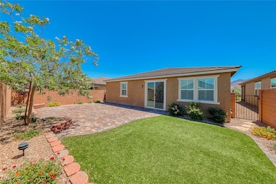 Rear view of property with a patio, a fenced backy