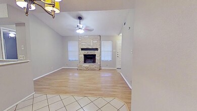 Unfurnished living room featuring lofted ceiling,