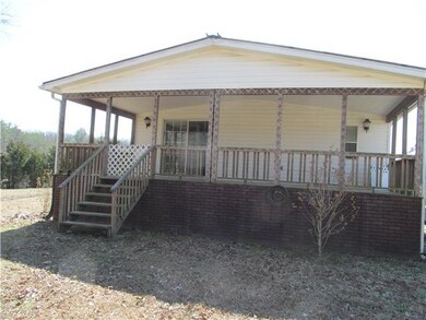 covered deck on side of home