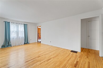 Living room leading to kitchen