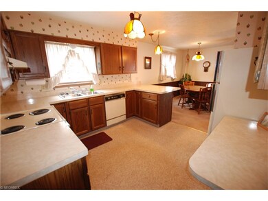 Spacious Kitchen with Wood Cabinets