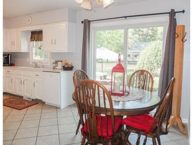 Dining room with tile flooring.