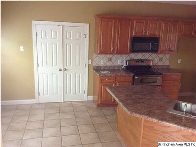 Kitchen features a breakfast bar and still has ton