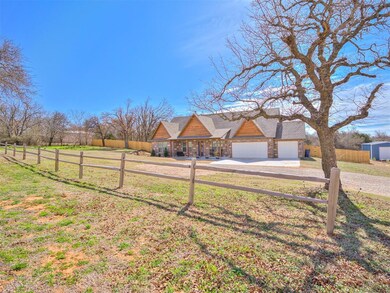 Ranch-style house with a front lawn and a garage