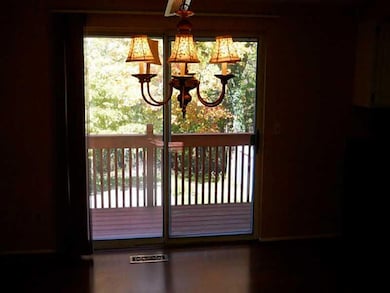 Dining Room. With with sliding door showing deck o