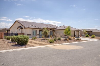 View of front facade with stucco siding, an attach