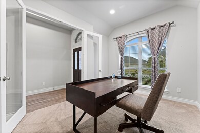 Office with glass french doors.