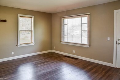 The living room has a picture window.
