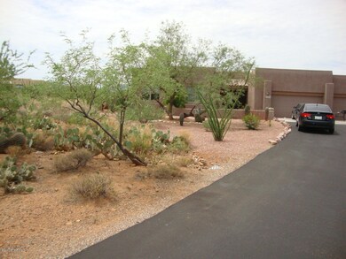 Long paved drive way to both homes