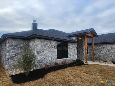 Front of home - flower beds