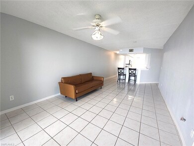 Unfurnished room with visible vents, baseboards, l