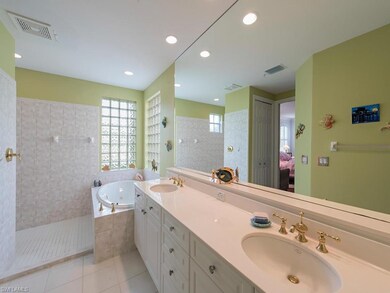 Master bathroom with walk in shower, soaking tub, 