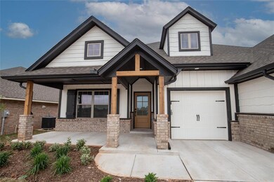 Craftsman-style home featuring a garage, a porch, 