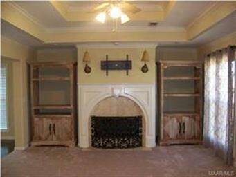Big great room with double box ceiling and firepla