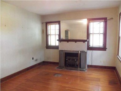 Living Room with decorative fireplace