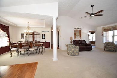 The open entryway has beautiful hardwood flooring.  The formal dining room is conveniently located adjacent to the formal living room and just a few feet from the kitchen.