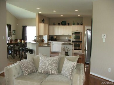 View of the Kitchen and Morning Room from the Fami