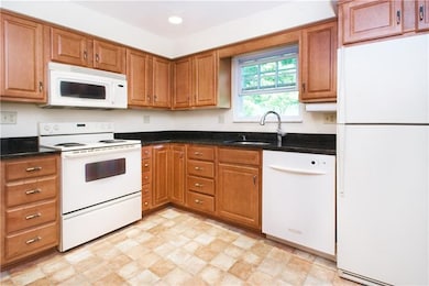 Plenty of beautiful maple cabinetry in this kitche