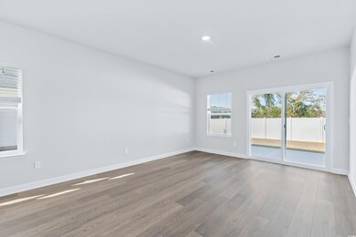 Spare room with wood-type flooring
