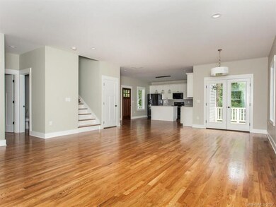 Comfortable kitchen entry expands into wide open s
