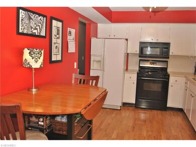 View of eating area in the bright & cheery kitchen