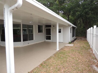 32422 Oak Park Dr. Leesburg, FL 34748-Side/Carport