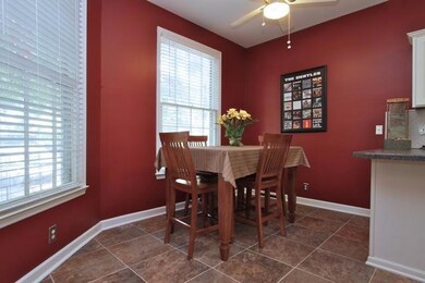 Enjoy your morning coffee or a casual meal in the dining area of the eat-in kitchen.