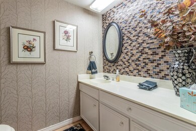 Downstairs bath with beautiful tile wall is perfec