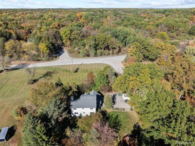 Aerial overview of property's location with a forest