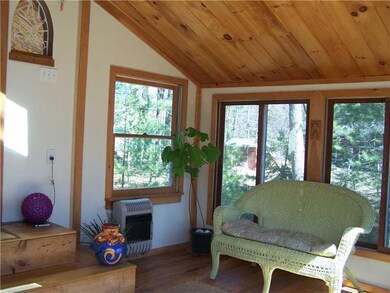 Other. Heated Sunroom with cathedral...