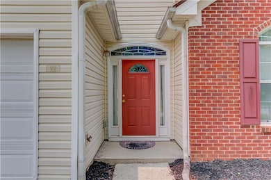 Property entrance with brick siding