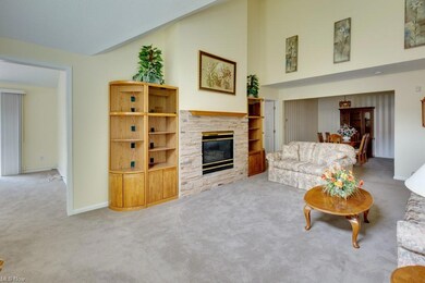opens to dining and kitchen and 4 season room