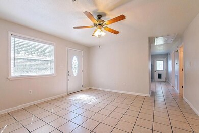 View of Living Room & Hallway leading to the Kitch