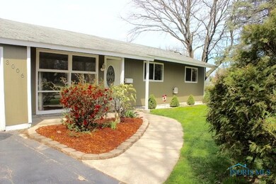 Front facade with beautiful landscaping